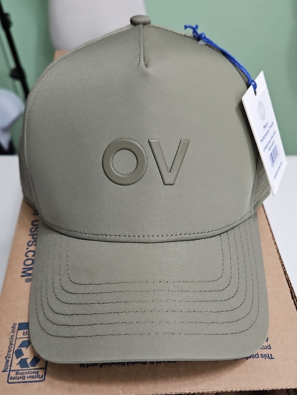 OUTDOOR VOICES men's performance trucker cap